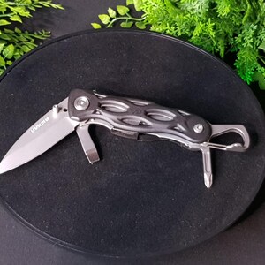 Leatherman E302 tool. Discontinued item. Hard to find.