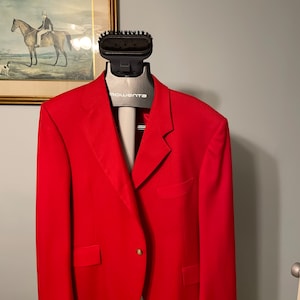 Men’s red show jumping jacket.