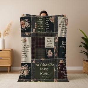 May include: A patchwork throw blanket with floral and scripture designs. The blanket features squares with quotes like "Cast all your anxiety on Him" and "Trust God's plan." The blanket is personalized with the text "to Charlie Love, Nana 12.12.25."