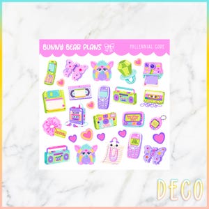 May include: A sticker sheet titled BUNNY BEAR PLANS MILLENNIAL CORE featuring colorful illustrations of 1990s and 2000s nostalgia items including flip phones, cassette players, floppy disks, butterfly clips, a Tamagotchi, and a Furby toy.
