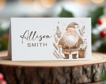 May include: A white place card with a brown Santa Claus illustration and the text "Alison SMITH".