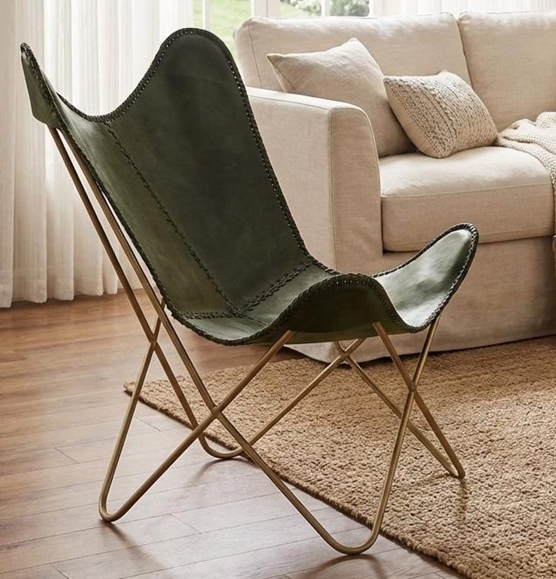 modern butterfly chair, luxury leather chair, designer accent chair, handmade furniture, contemporary seating, leather home decor, vintage style chair, minimalist furniture, reading nook chair, industrial modern chair, premium lounge chair, cozy accent chair, artisan furniture