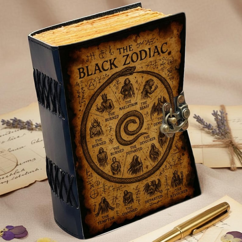 Medieval-style fantasy journal with zodiac sigil artwork and textured deckle-edge pages.