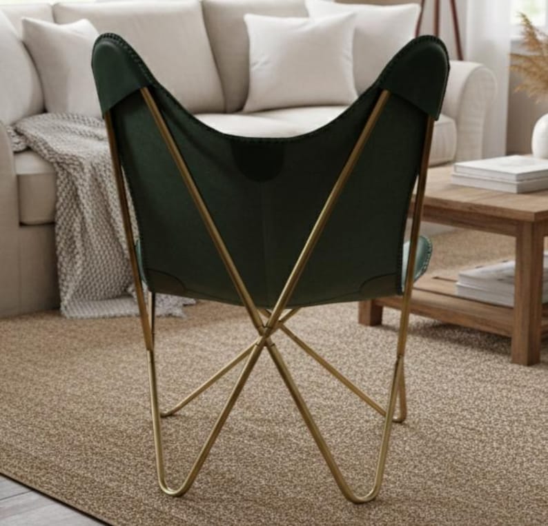 modern butterfly chair, luxury leather chair, designer accent chair, handmade furniture, contemporary seating, leather home decor, vintage style chair, minimalist furniture, reading nook chair, industrial modern chair, premium lounge chair, cozy accent chair, artisan furniture