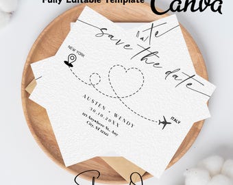 May include: White wedding invitation with a travel theme. The invitation features the text "Save the Date" in elegant script, a dotted line with a heart, and a small airplane. The text includes the names Austen and Wendy, and the date 30.10.20XX.