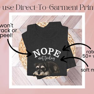 May include: Dark gray t-shirt with the text "NOPE not today" above a Schnauzer dog illustration. The shirt is made of soft material and is rated for 50+ washes. The image also states "won't crack or peel!"