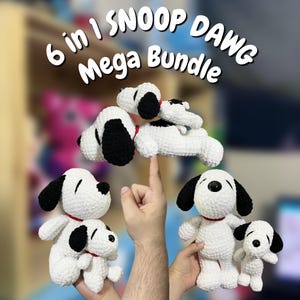 May include: A collection of six white and black crocheted dog plush toys with red collars. The text 6 in 1 SNOOP DAWG Mega Bundle is displayed at the top. The plush toys vary in size, featuring black ears, black eye patches, and black noses.