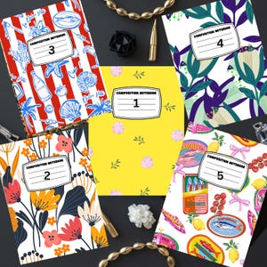 May include: Five composition notebooks with distinct covers: one with red and white stripes and blue icons, one with yellow background and small floral motifs, one with large colorful flowers, one with purple and green foliage, and one with sardine cans.