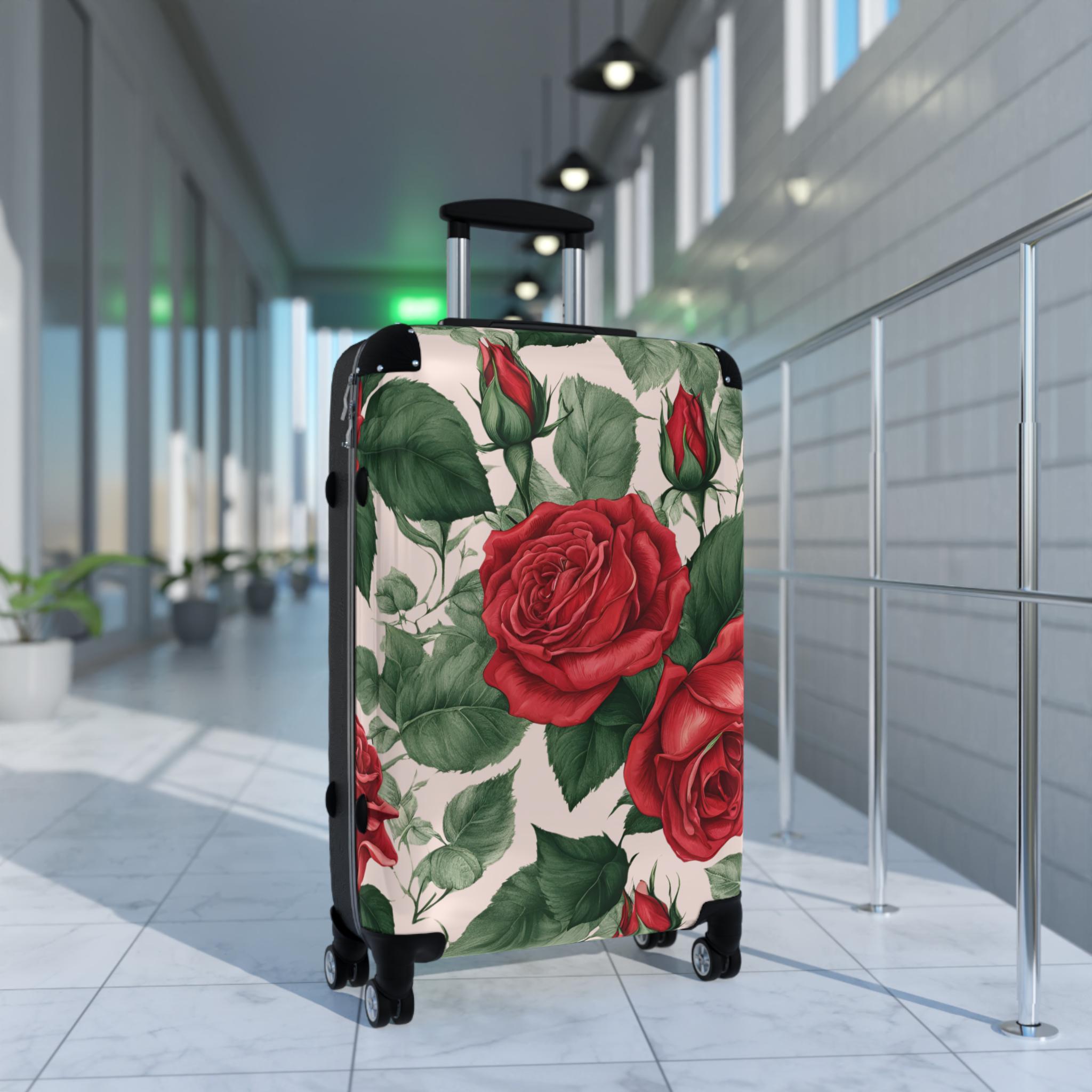 荷物スーツケース 赤いバラのトワル柄 ブラッシュピンクの背景 旅行用