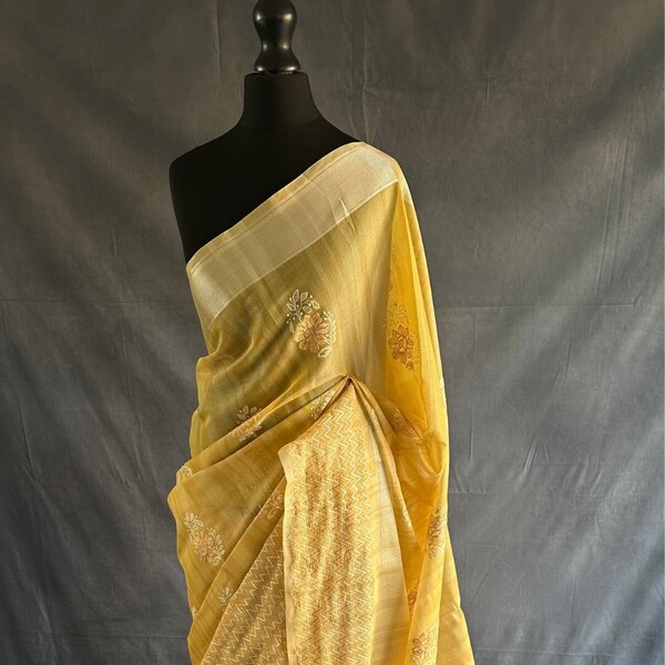 Yellow chanderi silk saree with silver zari weaving