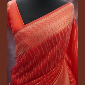 Red Banarasi chinon georgette saree with pearl drop design in gold zari&traditional gold borders, floral pallu. Available in Pink. FALL Done