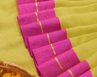 Yellow mul Mul cotton saree with pink contrast border
