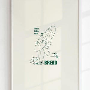 May include: A green line drawing of a person carrying a large loaf of bread with the text "Life is better with BREAD" below. A small dog is walking next to the person.