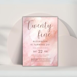 May include: A pink and peach watercolour background with the text "Twenty fine" in a brown script font. The text "Alexandra is turning 25!" is below in a smaller brown font. The text "Please join us to celebrate" is below in an even smaller brown font. The text "Sat 22 Feb" is below in a larger brown font. The text "At seven o'clock in the evening" is below in a smaller brown font. The text "The Candy Bar, Sydney" is below in an even smaller brown font. The text "RSVP by the 2nd February to Alex on 00000000" is below in a larger brown font.