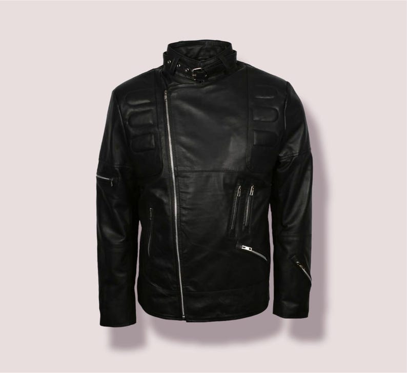 May include: A black leather jacket with a zipper closure and multiple pockets. The jacket has a stand-up collar and a zippered detail on the sleeves.