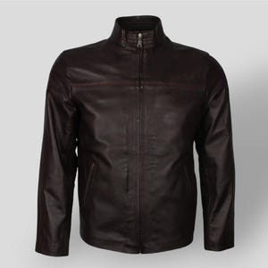 May include: A dark brown leather jacket with a zipper closure and a stand-up collar.