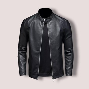 May include: A black leather jacket with a zipper closure and a stand-up collar.