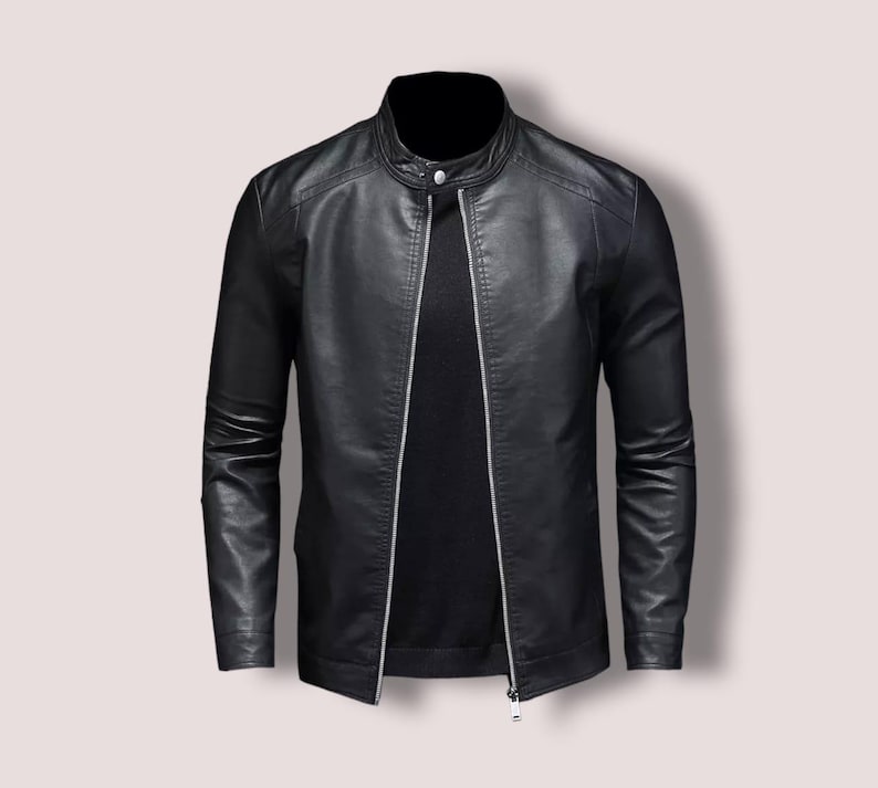 May include: A black leather jacket with a zipper closure and a stand-up collar.