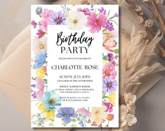 May include: A floral birthday party invitation with a watercolor border of pink, purple, blue, and yellow flowers. The text reads "Birthday Party" and includes the name "Charlotte Rose", the date "Sunday, July 20th", the time "2 o'clock in the afternoon", the location "Sweet Garden Room", the address "123 Mill Street, Half Moon Bay, San Francisco, CA 94133", and the RSVP information "RSVP to Katy 123-123-4567 or Katy@email.com".