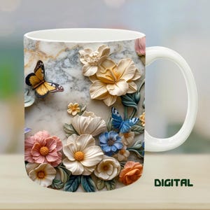 May include: White ceramic mug featuring a marble-like design with 3D floral and butterfly accents in pastel colors. The mug has a white handle and the word "DIGITAL" is printed on the side.