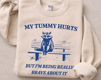 J'ai mal au ventre mais j'en suis vraiment courageux Sweat-shirt ras du cou unisexe