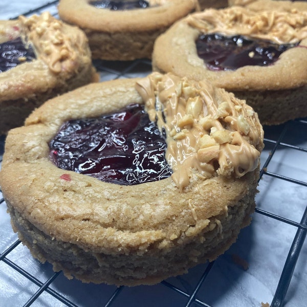 Peanut Butter and Jelly Cookie Delicious Peanut Butter & Jelly Stuffed Cookies - Homemade Gourmet Treats