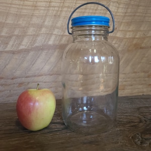 Vintage 1.5 quart jar with built on metal handle- primitive/farmhouse decor- an old salad dressing or mayo jar with handle