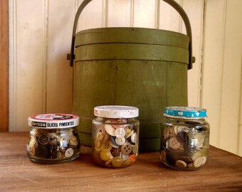 Set of 3! A old jars full of vintage buttons & wooden spools- 1960s and older- 2 old baby food jars and a  pimento jar! Good for crafting!