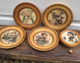 Set of 5 vintage “Hummel” wooden plates & musical wall hanging-made in West Germany- Swiss musical movement with their National anthem tune