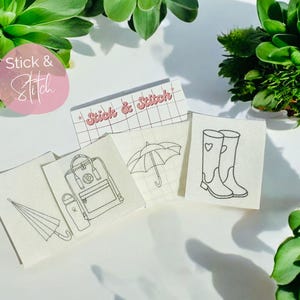 May include: A collection of embroidered patches featuring umbrella, backpack, water bottle, and rain boot designs. The patches are displayed on a white surface with the "Stick & Stitch" logo in pink.