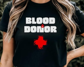 Maglietta per donatori di sangue: grafica, supporto medico, aspetto vissuto