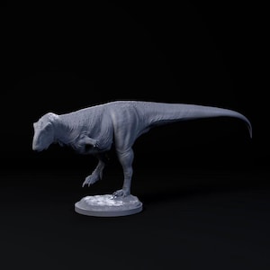 May include: A grey, detailed dinosaur figurine standing on a grey base. The dinosaur is posed in a walking position with its head lowered.