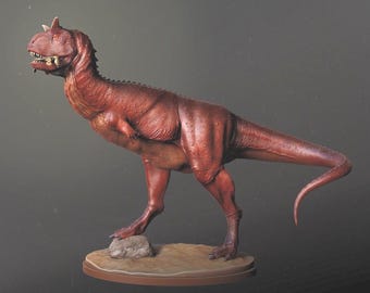 Modelo a escala de un Carnotaurus comiendo - Dinosaurio miniatura impreso en resina 3D