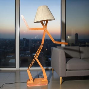 Human-Shaped Wood Floor Lamp Adjustable Sculptural Design