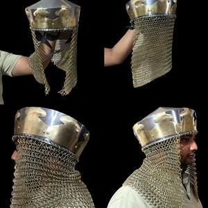 May include: A medieval helmet with a chainmail coif. The helmet is made of steel and has a brass crown. The coif is made of interlocking metal rings.