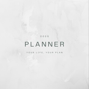 May include: A 2025 planner with a watercolor-style design. The cover features the word "PLANNER" in a dark teal font, with the year "2025" above it. The phrase "YOUR LIFE, YOUR PLAN" is below the word "PLANNER". The background has a white and gray watercolor wash.