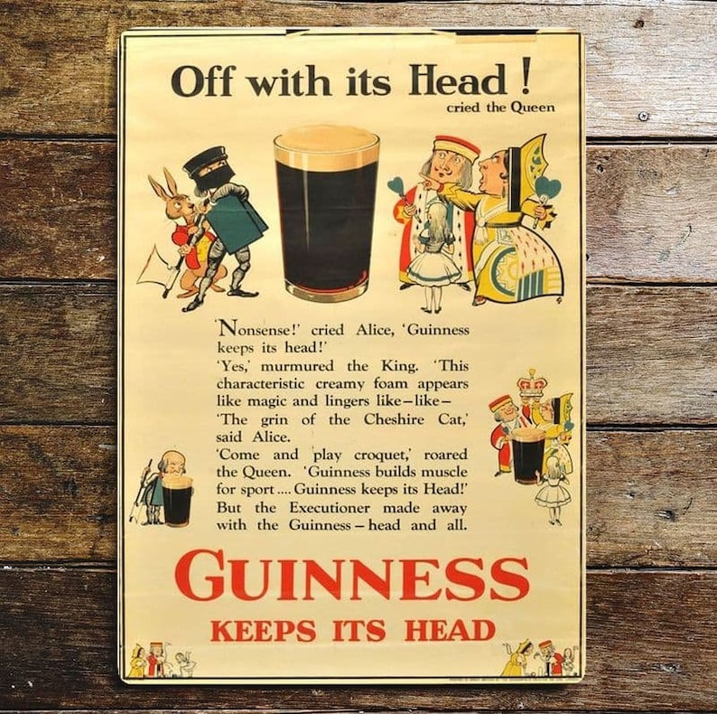 May include: Vintage Guinness beer advertisement poster featuring Alice in Wonderland characters. The poster features a glass of Guinness with the text "Off with its Head!" and "Guinness Keeps its Head!"
