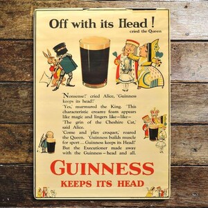 May include: Vintage Guinness beer advertisement featuring Alice in Wonderland characters. The text reads "Off with its Head! cried the Queen" and "Guinness keeps its head!"