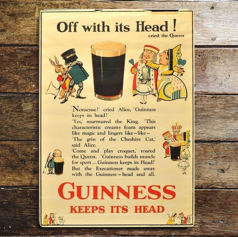 May include: Vintage Guinness beer advertisement featuring Alice in Wonderland characters. The text reads "Off with its Head! cried the Queen" and "Guinness keeps its head!"