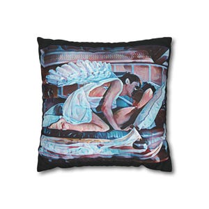 May include: Decorative square pillow with a black border. The pillow features an artistic depiction of two people embracing in a passionate kiss. The artwork is rendered in a painterly style with soft colors.
