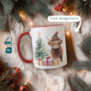 May include: White ceramic mug with a red handle and rim. The mug features a Christmas tree and a Highland cow wearing a plaid hat and scarf. The text "Your design here" is above the mug.