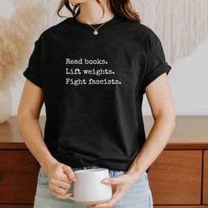 Reading Workout Tee Intellectual Fitness Apparel Book Gym Shirt Statement Design Bold Graphic Print Comfortable Fabric Multiple Colors Available Perfect Gift Idea Book Lover Present Gym Enthusiast Option Unique Style Choice Casual Everyday