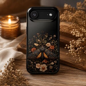 Vintage Aesthetic Phone Case Dark Academia Style Moth Botanical Design Gothic Romance Floral Pattern Magnetic Protection MagSafe Compatible Impact Resistant Shell Dual Layer Construction Nature Inspired Artwork Moody Background Cottagecore