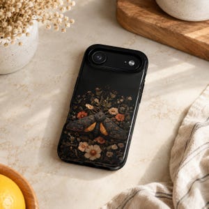 Impact Resistant Phone Case Dual Layer Protection Magnetic MagSafe Compatible Shell Moth Botanical Design Vintage Floral Pattern Polycarbonate Construction TPU Cushioned Liner Scratch Resistant Surface Dark Moody Aesthetic Nature Lover Gift