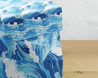 May include: Two blue and white gift boxes with a wave pattern. The boxes are stacked on top of each other.