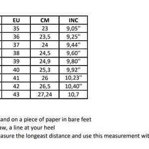 May include: A size conversion chart for shoes, showing US, EU, CM, and inch measurements. The chart is printed on a white background with black text.