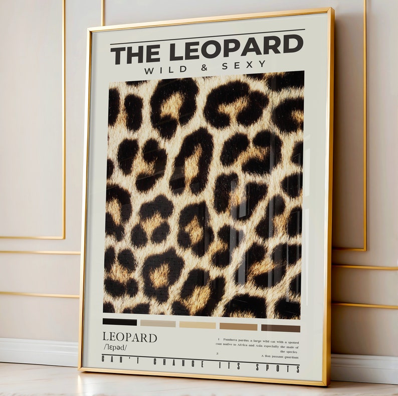 May include: A poster with a leopard print background. The text "THE LEOPARD WILD & SEXY" is at the top of the poster. The word "LEOPARD" is written in a larger font at the bottom of the poster, with the phonetic spelling "/ˈlepərd/" underneath. The text "CAN'T CHANGE ITS SPOTS" is at the bottom of the poster.