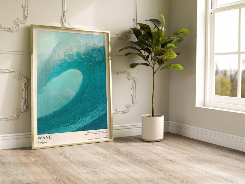 May include: A framed poster with a photograph of a large, blue wave crashing. The poster has the word "WAVE" in large, bold letters at the bottom, with the phonetic spelling "weyv" underneath.