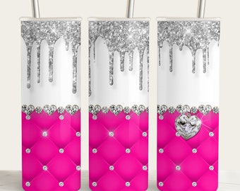 May include: Three stainless steel tumblers with a pink and silver design. The tumblers have a white background with silver glitter dripping down. The bottom of the tumblers feature a pink quilted design with silver rhinestones. One tumbler has a large silver rhinestone heart.
