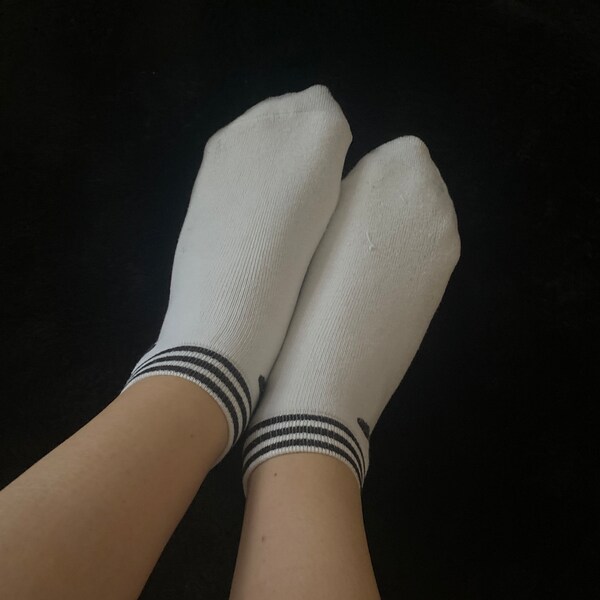 worn sports socks | white